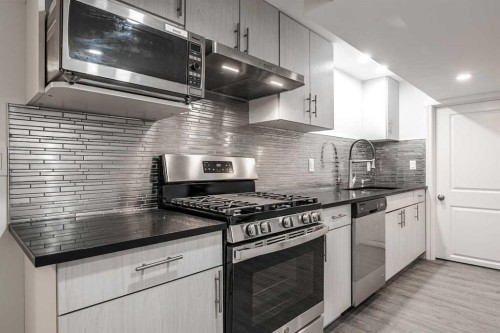 4712 Vegas Road Nw, Calgary, AB - Indoor Photo Showing Kitchen With Upgraded Kitchen