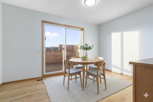 165 Quigley Drive, Cochrane, AB - Indoor Photo Showing Dining Room