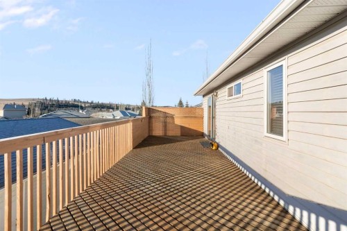 165 Quigley Drive, Cochrane, AB - Outdoor With Exterior