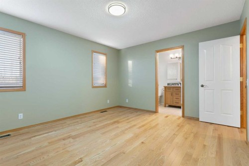 165 Quigley Drive, Cochrane, AB - Indoor Photo Showing Other Room
