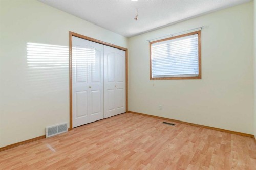 165 Quigley Drive, Cochrane, AB - Indoor Photo Showing Other Room