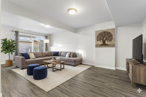 165 Quigley Drive, Cochrane, AB - Indoor Photo Showing Living Room