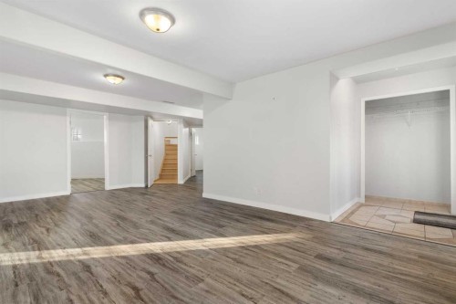 165 Quigley Drive, Cochrane, AB - Indoor Photo Showing Other Room