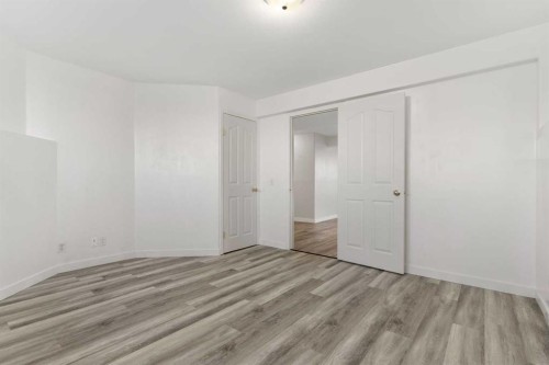 165 Quigley Drive, Cochrane, AB - Indoor Photo Showing Other Room