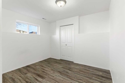 165 Quigley Drive, Cochrane, AB - Indoor Photo Showing Other Room
