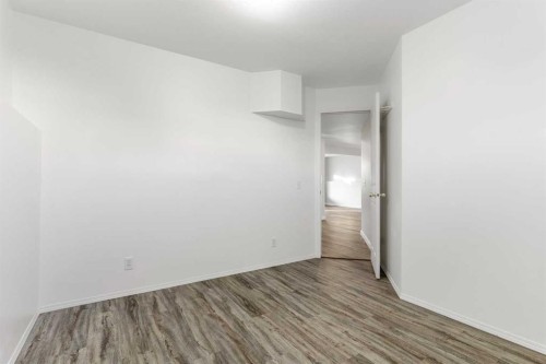 165 Quigley Drive, Cochrane, AB - Indoor Photo Showing Other Room