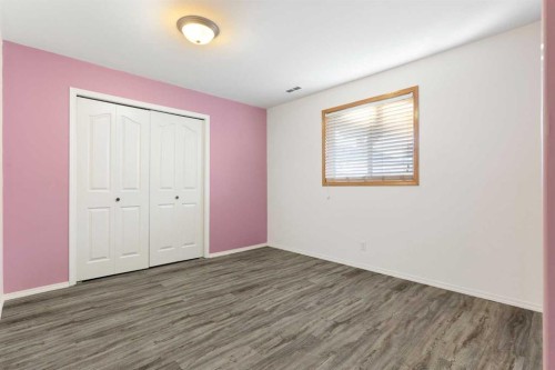 165 Quigley Drive, Cochrane, AB - Indoor Photo Showing Other Room