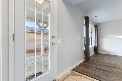 165 Quigley Drive, Cochrane, AB - Indoor Photo Showing Other Room