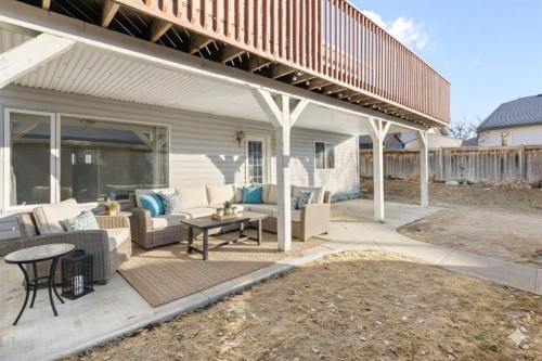 165 Quigley Drive, Cochrane, AB - Outdoor With Deck Patio Veranda With Exterior