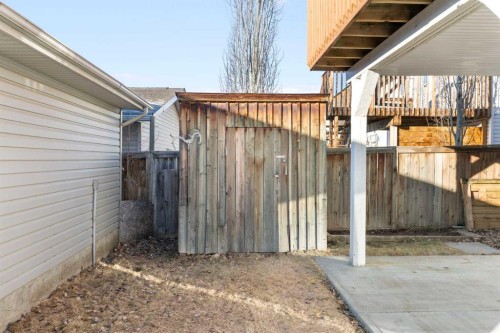 165 Quigley Drive, Cochrane, AB - Outdoor With Exterior