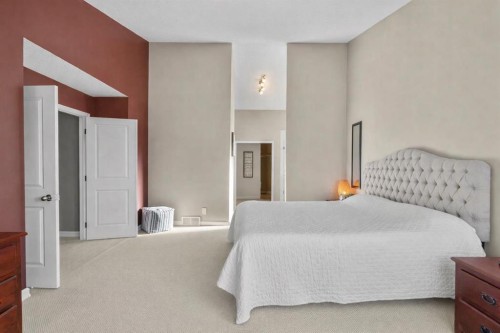 16 Woodacres Drive Sw, Calgary, AB - Indoor Photo Showing Bedroom