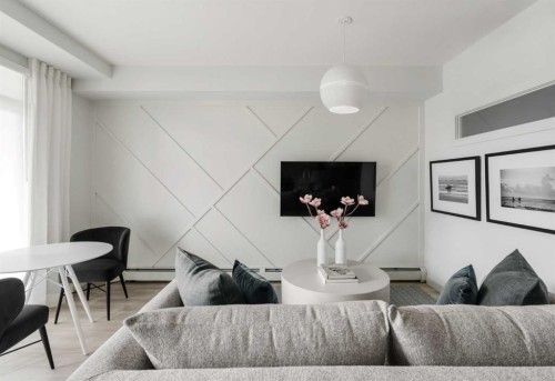 210-60 Water Cove Se, Calgary, AB - Indoor Photo Showing Living Room