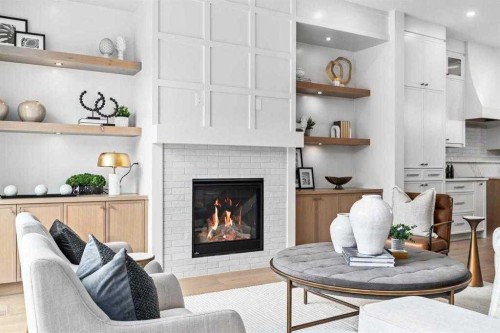 2533 2 Avenue Nw, Calgary, AB - Indoor Photo Showing Living Room With Fireplace