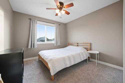 136 Wildrose Crescent, Strathmore, AB - Indoor Photo Showing Bedroom