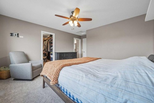 136 Wildrose Crescent, Strathmore, AB - Indoor Photo Showing Bedroom