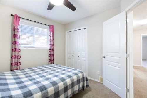 138 Saddlecrest Way Ne, Calgary, AB - Indoor Photo Showing Bedroom