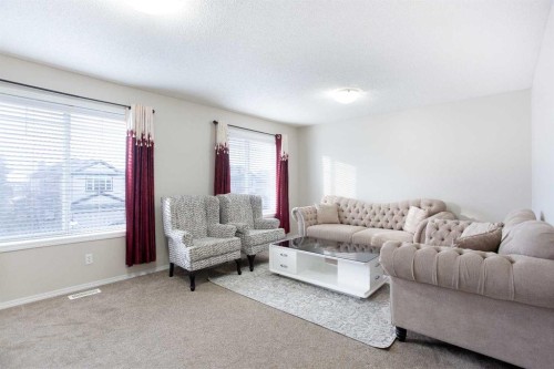 138 Saddlecrest Way Ne, Calgary, AB - Indoor Photo Showing Living Room