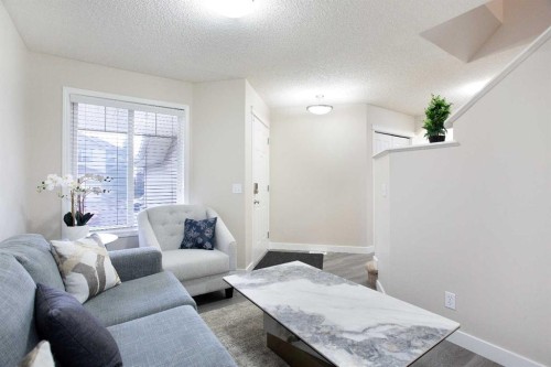 138 Saddlecrest Way Ne, Calgary, AB - Indoor Photo Showing Living Room