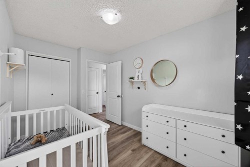 98 Ranch Glen Drive Nw, Calgary, AB - Indoor Photo Showing Bedroom