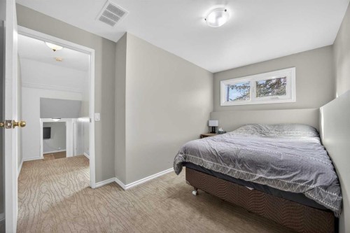 98 Ranch Glen Drive Nw, Calgary, AB - Indoor Photo Showing Bedroom