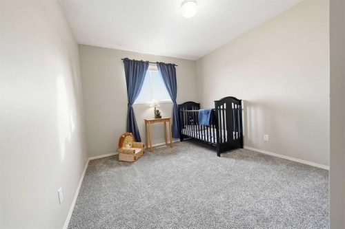 302 Strathaven Drive, Strathmore, AB - Indoor Photo Showing Bedroom