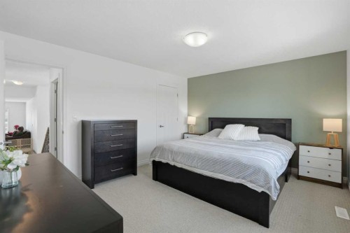 49 Williamstown Green Nw, Airdrie, AB - Indoor Photo Showing Bedroom