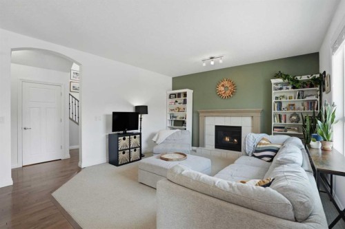 49 Williamstown Green Nw, Airdrie, AB - Indoor Photo Showing Living Room With Fireplace