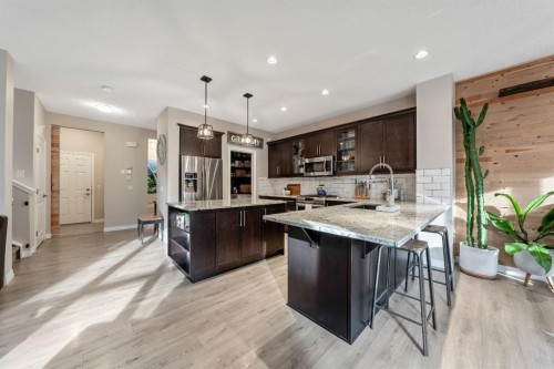 159 Riviera View, Cochrane, AB - Indoor Photo Showing Kitchen With Stainless Steel Kitchen With Upgraded Kitchen