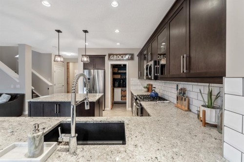 159 Riviera View, Cochrane, AB - Indoor Photo Showing Kitchen With Upgraded Kitchen
