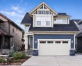 159 Riviera View, Cochrane, AB  - Outdoor With Facade 