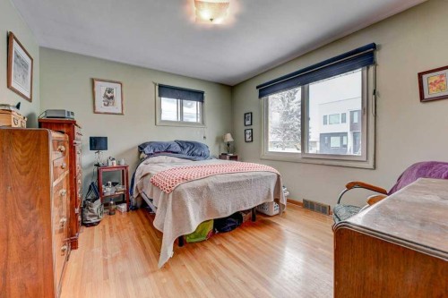 1455 Russell Road Ne, Calgary, AB - Indoor Photo Showing Bedroom