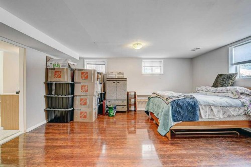 1455 Russell Road Ne, Calgary, AB - Indoor Photo Showing Bedroom