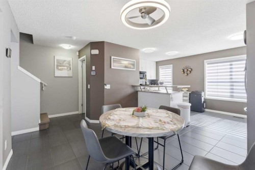 59 New Brighton Common Se, Calgary, AB - Indoor Photo Showing Dining Room