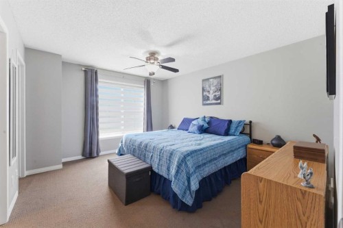 59 New Brighton Common Se, Calgary, AB - Indoor Photo Showing Bedroom