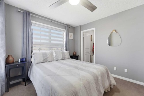 59 New Brighton Common Se, Calgary, AB - Indoor Photo Showing Bedroom