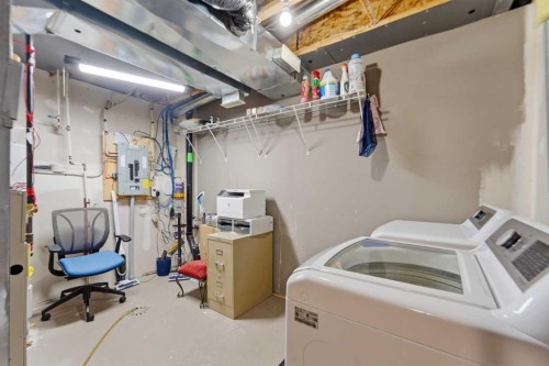 59 New Brighton Common Se, Calgary, AB - Indoor Photo Showing Laundry Room