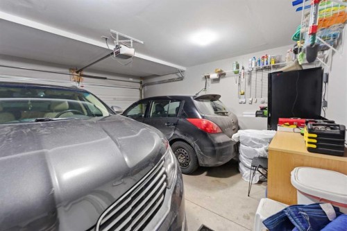 59 New Brighton Common Se, Calgary, AB - Indoor Photo Showing Garage