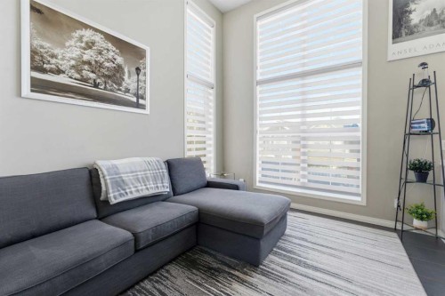 59 New Brighton Common Se, Calgary, AB - Indoor Photo Showing Living Room