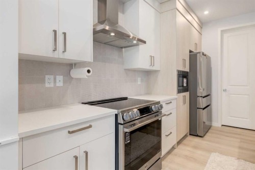 29 Marmot Passage Nw, Calgary, AB - Indoor Photo Showing Kitchen With Stainless Steel Kitchen With Upgraded Kitchen