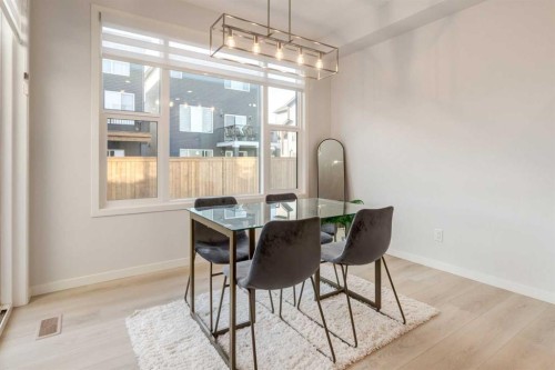 29 Marmot Passage Nw, Calgary, AB - Indoor Photo Showing Dining Room