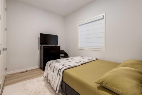 29 Marmot Passage Nw, Calgary, AB - Indoor Photo Showing Bedroom
