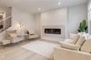 29 Marmot Passage Nw, Calgary, AB  - Indoor Photo Showing Living Room With Fireplace 