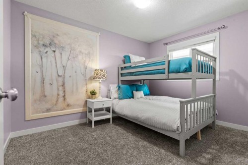 69 Ravenskirk Close Se, Airdrie, AB - Indoor Photo Showing Bedroom