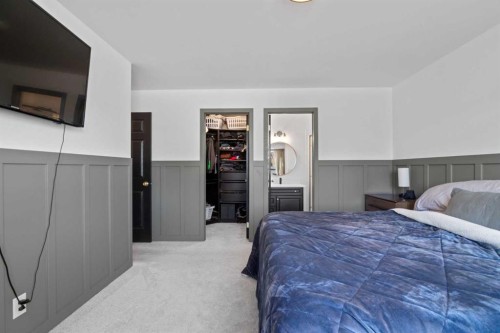 21 Wilson Road Ne, Langdon, AB - Indoor Photo Showing Bedroom