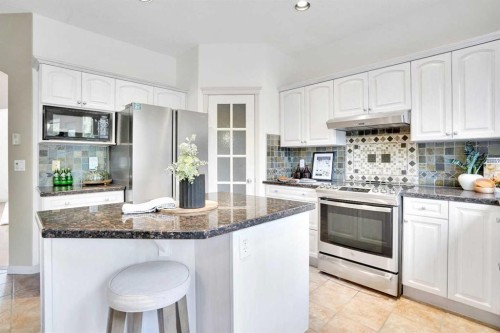 38 Strathridge Crescent Sw, Calgary, AB - Indoor Photo Showing Kitchen With Stainless Steel Kitchen With Upgraded Kitchen