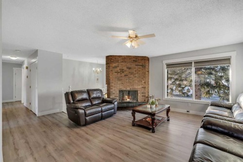 108 Whiteglen Crescent Ne, Calgary, AB - Indoor Photo Showing Living Room With Fireplace