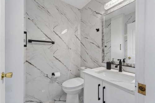 49 Taravista Way Ne, Calgary, AB - Indoor Photo Showing Bathroom