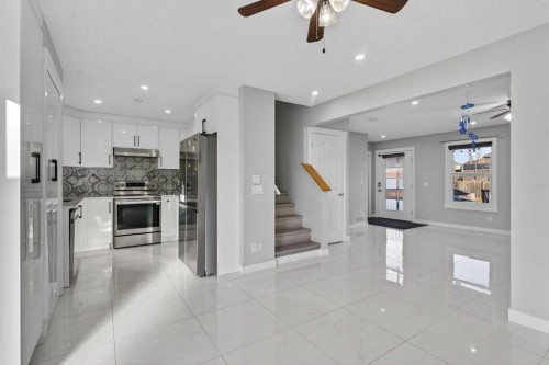 49 Taravista Way Ne, Calgary, AB - Indoor Photo Showing Kitchen With Upgraded Kitchen