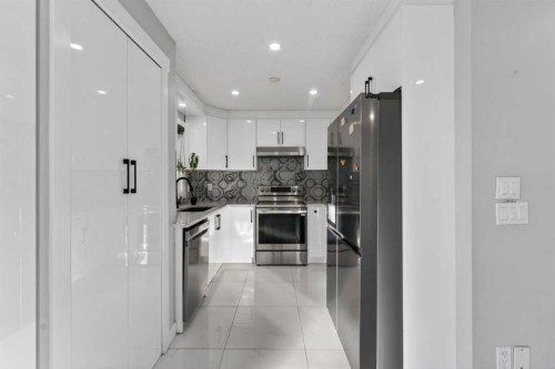 49 Taravista Way Ne, Calgary, AB - Indoor Photo Showing Kitchen With Upgraded Kitchen