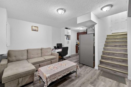 49 Taravista Way Ne, Calgary, AB - Indoor Photo Showing Living Room